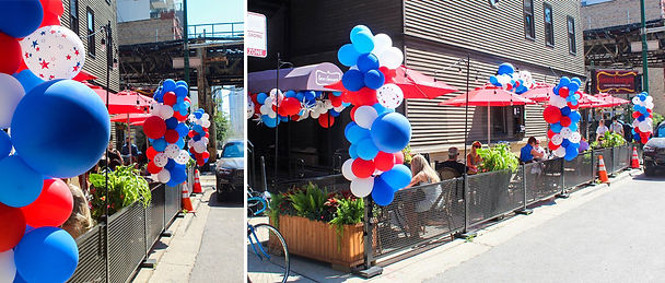 Pretty sidewalk cafe with bright red, white, and blue balloon decorations