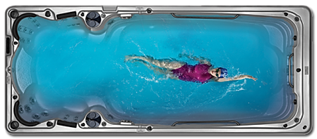 Hydropool Aquatrainer swim spa with swimmer