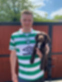 Sam the owner of Pawters Pet Servies with his puppy Sprocker Spaniel Obi who joined his family after he started the business and now comes along for group dog walks