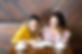 pretty-women-drinking-coffee-making-notes-cafe.jpg