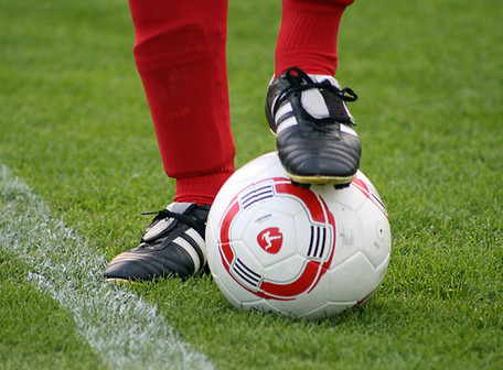 Cleats on Soccer Ball