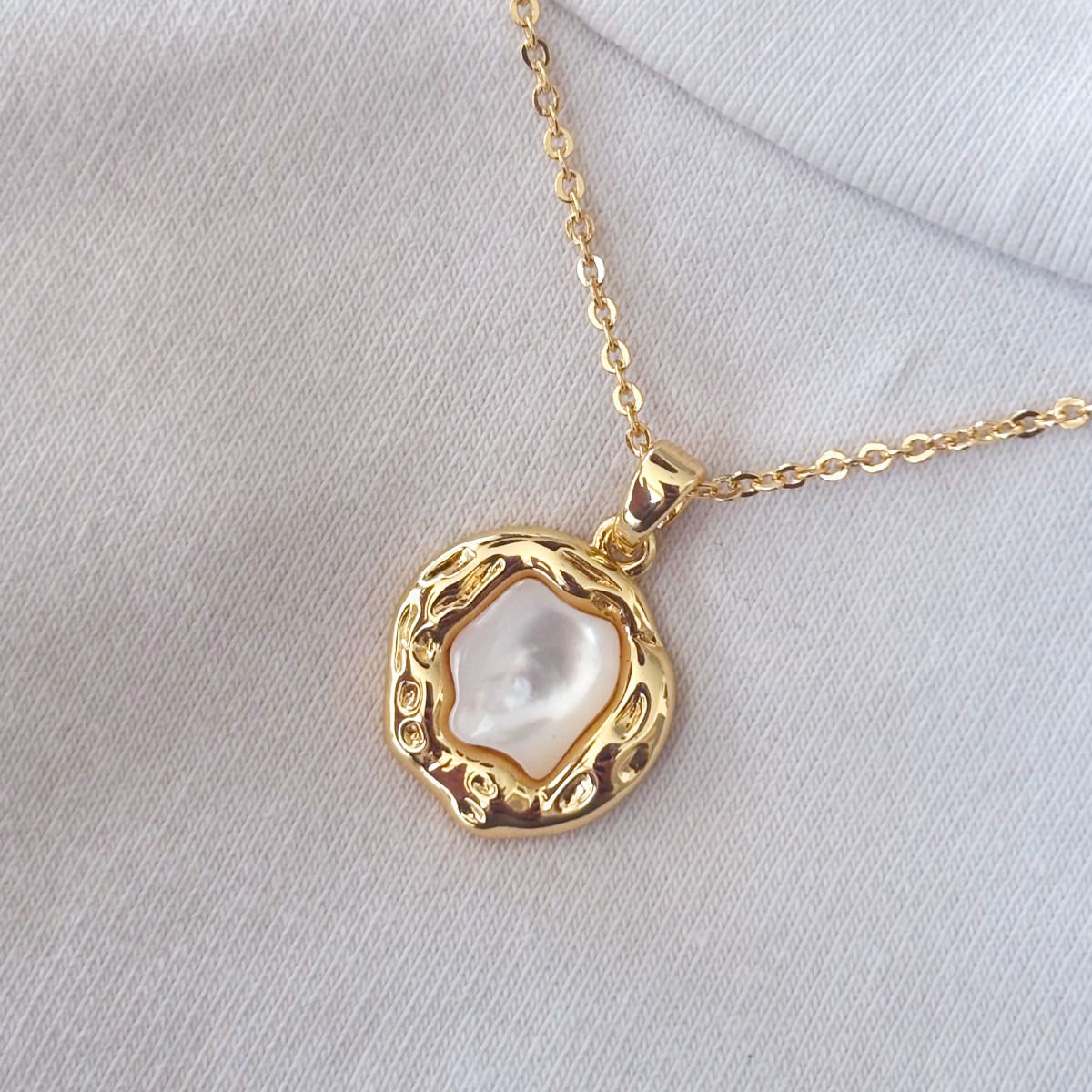 medallita irregular nacar