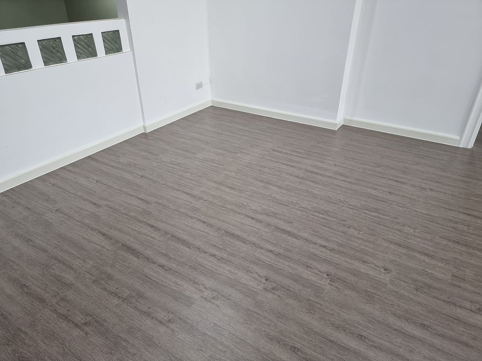 ปูพื้นลามิเนตห้องนั่งเล่น