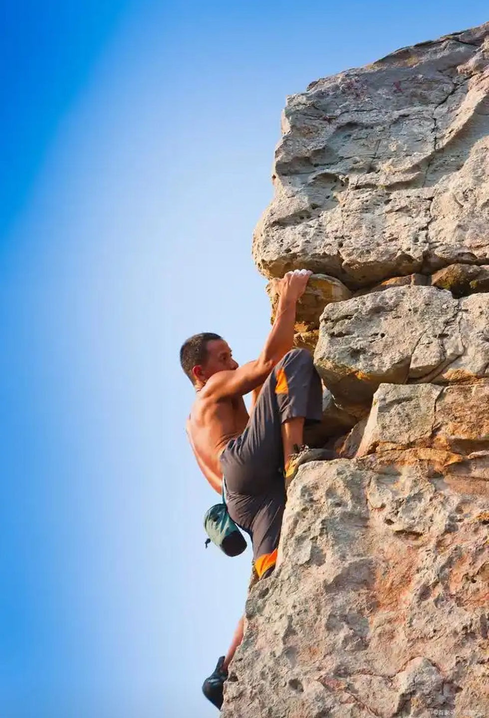 Man climbing mountain