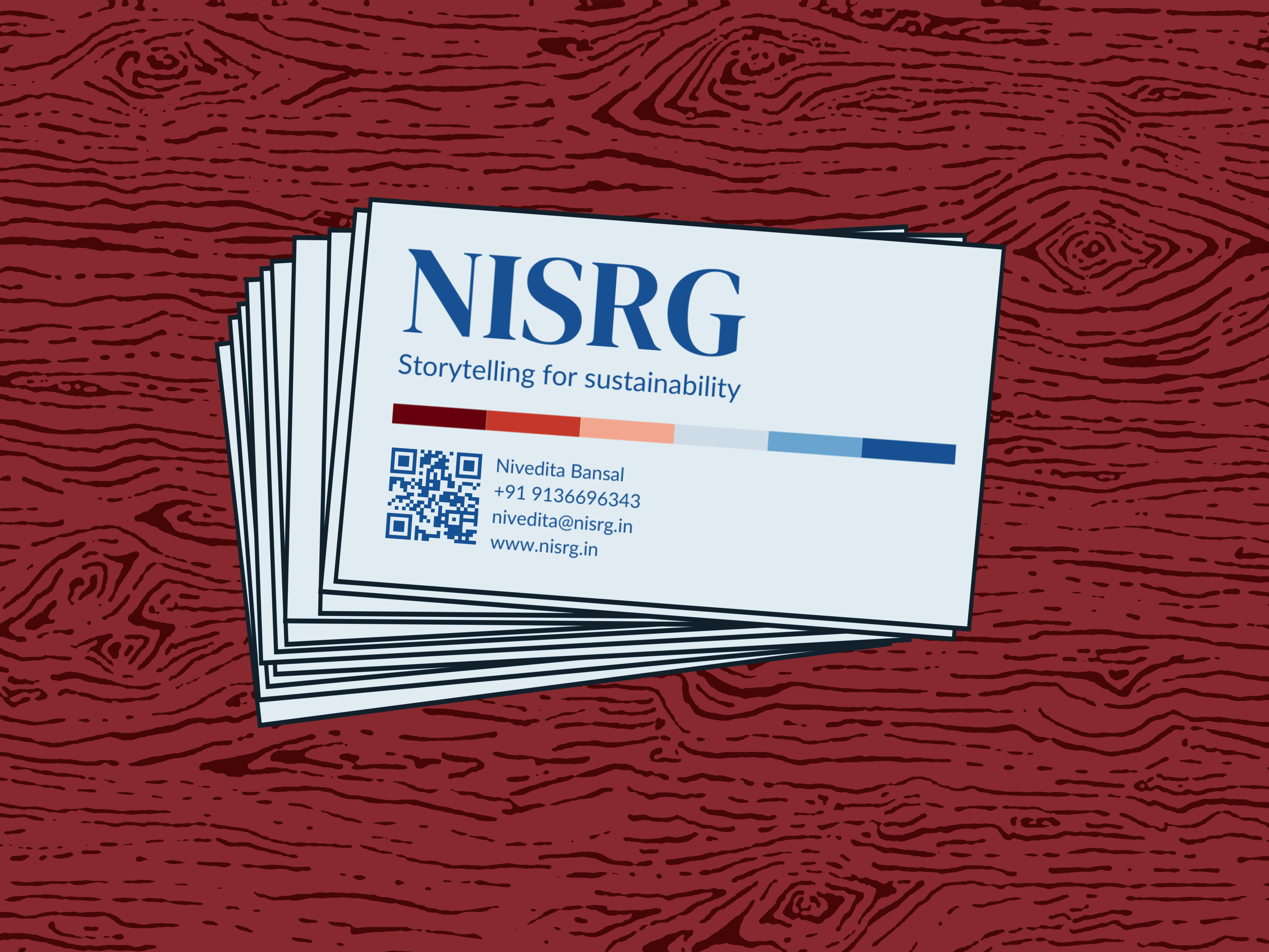 NISRG business card with tagline 'Storytelling for Sustainability' and founder’s contact details including phone and email.