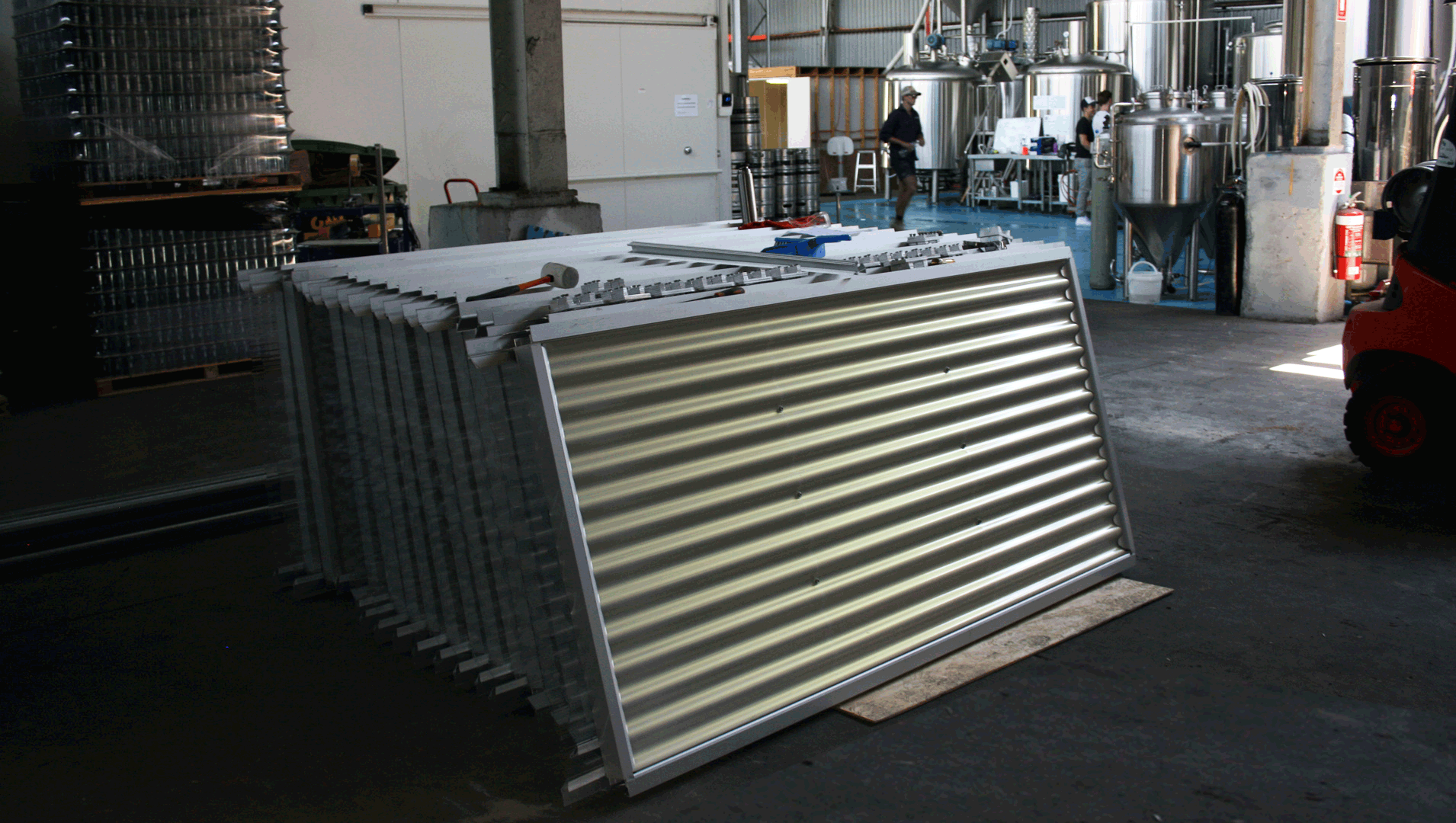 PlexiSun panels ready for installation at the Ballistic beer company brewery.gif