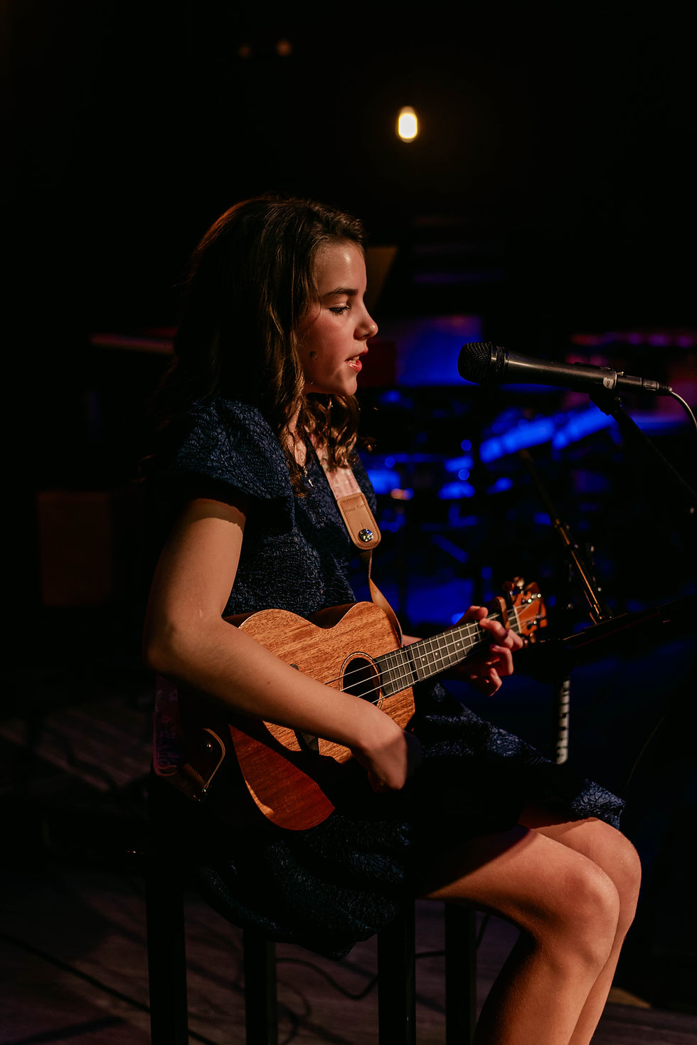 Bright smile from a young performer at Ocala Music and Arts
