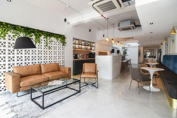 sleek office pantry with a couch