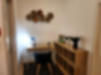 Home office: Desk, chair, shelves, and wall decor