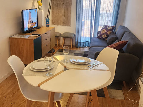 Modern apartment living room with dining table