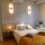 Comfortable double bed in bright bedroom