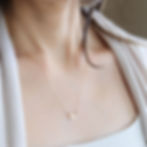 Pisces Water sign heart necklace on model. Soulful 14k gold filled zodiac choker Shokoro Canada