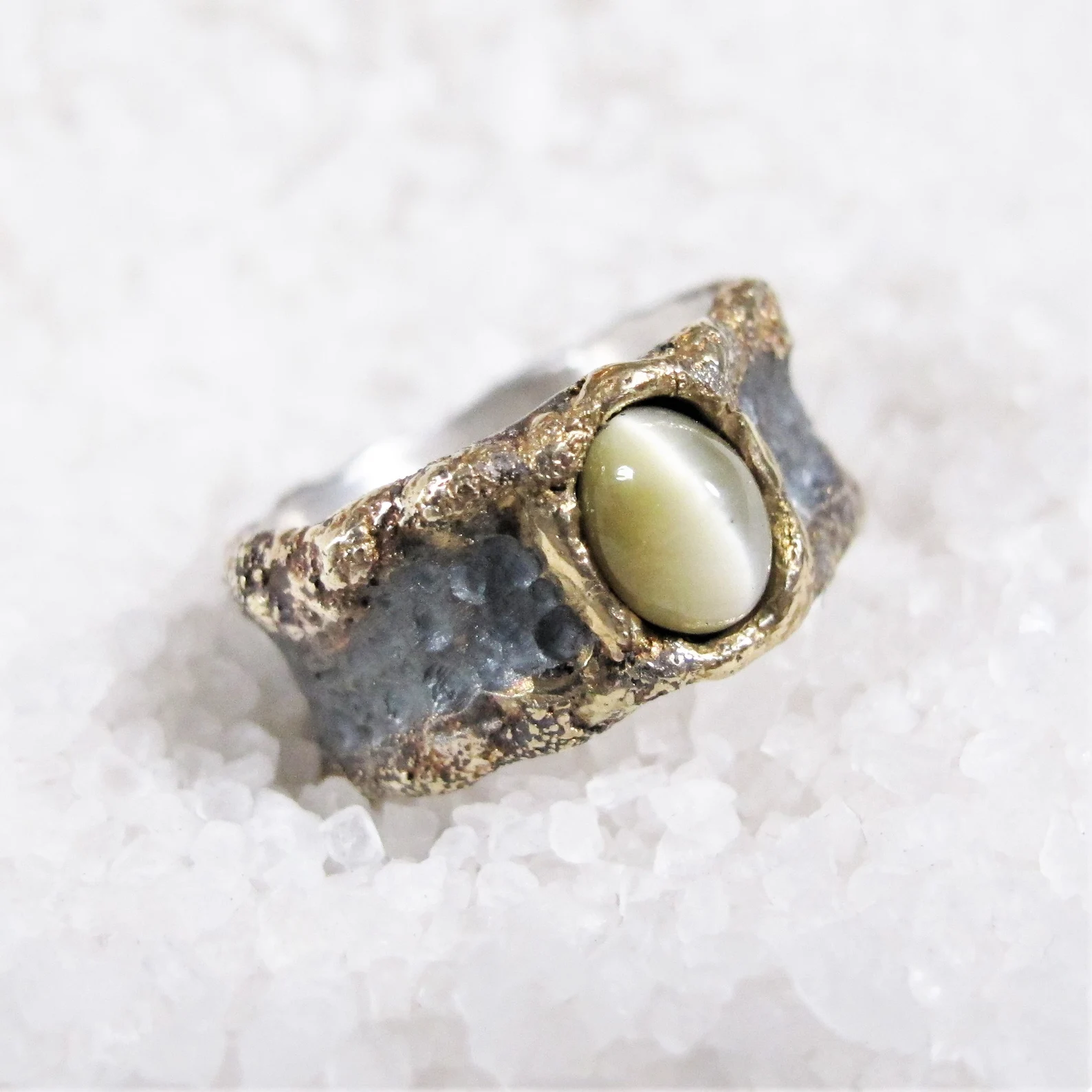 Cat's eye chrysoberyl chaos ring, cast gold, rustic oxidized silver