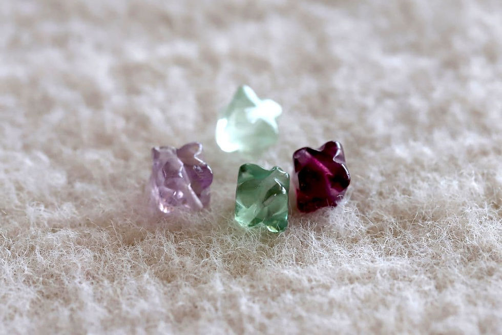 Colorful Fluorite beads from the Shokoro Handmade collection, illustrating the natural healing properties and intention for focus and mental clarity.