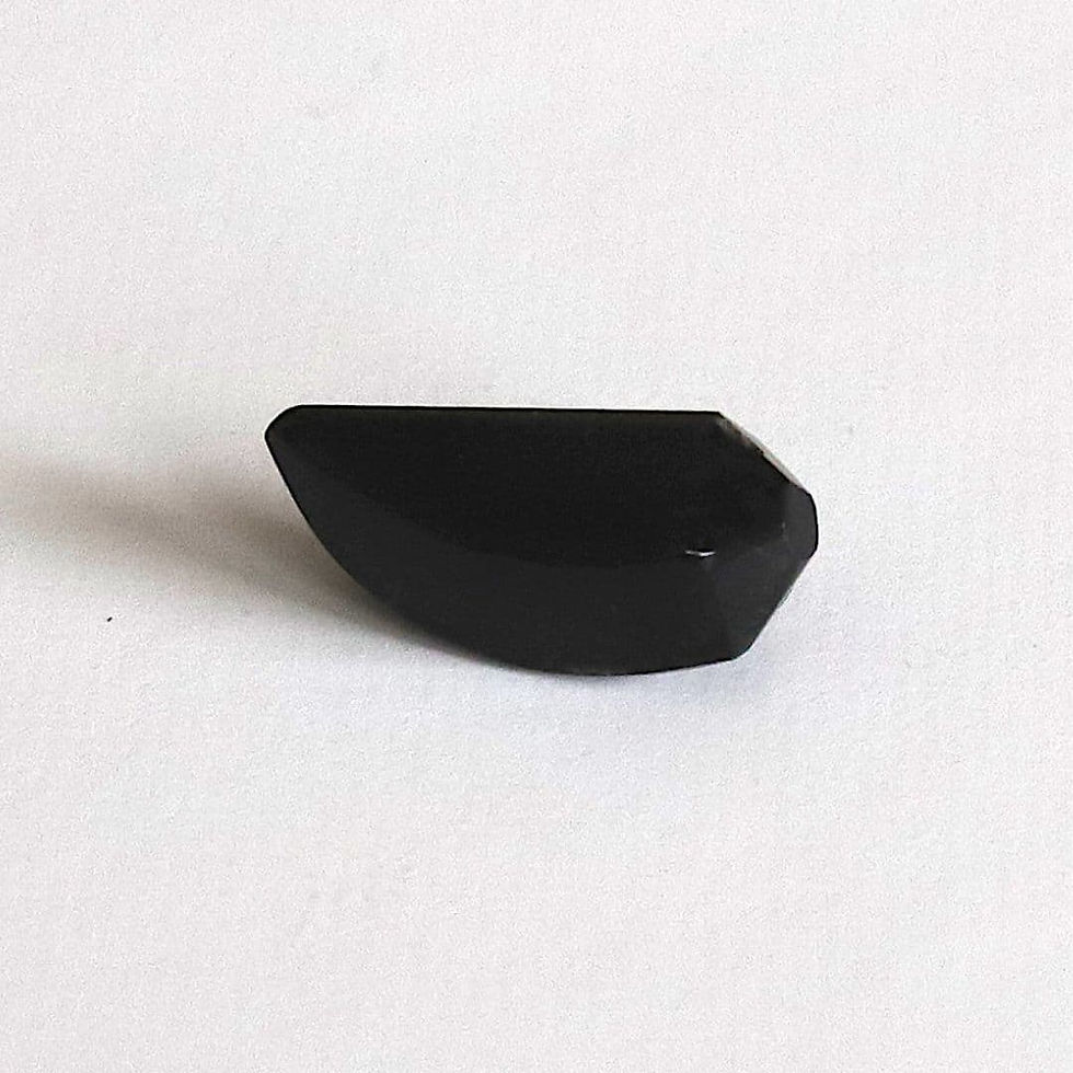 Genuine Black Onyx talon-cut stone from the Shokoro Handmade private collection, illustrating the natural healing properties and intention for protection and grounded power.
