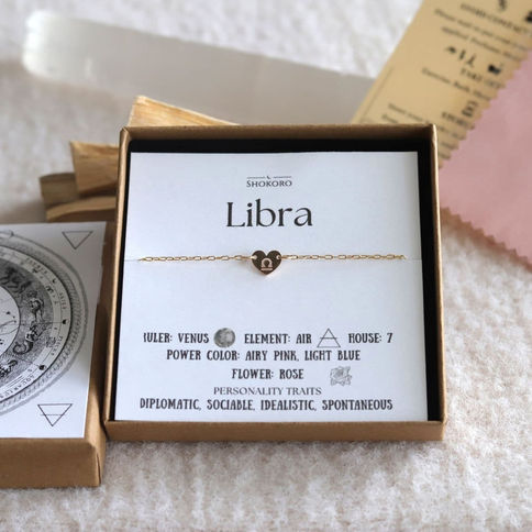 14k gold-filled Libra zodiac heart anklet in a jewelry box with meaning card. Customized astrology gift by Shokoro Handmade.