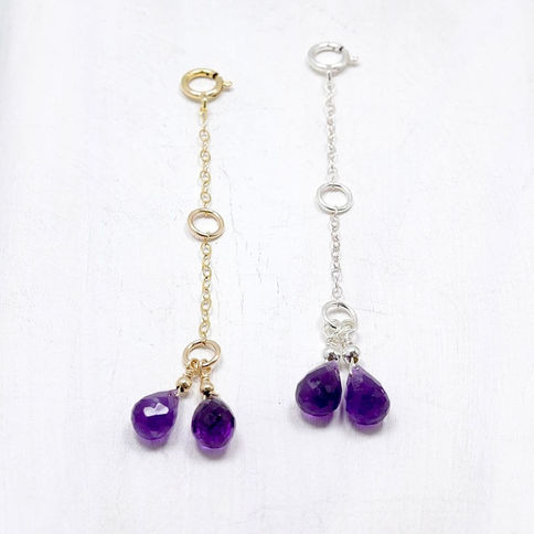 Gold and silver chain necklace extenders with purple amethyst gemstones, Creating a minimalist and elegant design.