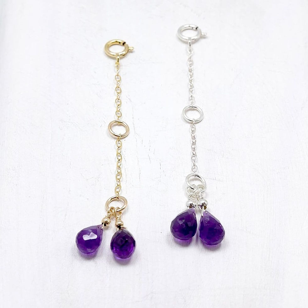 Gold and silver chain necklace extenders with purple amethyst gemstones, Creating a minimalist and elegant design.