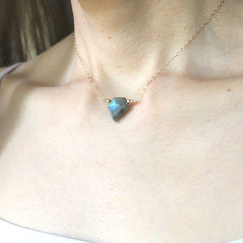 Woman is wearing a flash labradorite choker necklace with delicate chain, Unique and Elegant crystal transformation jewelry
