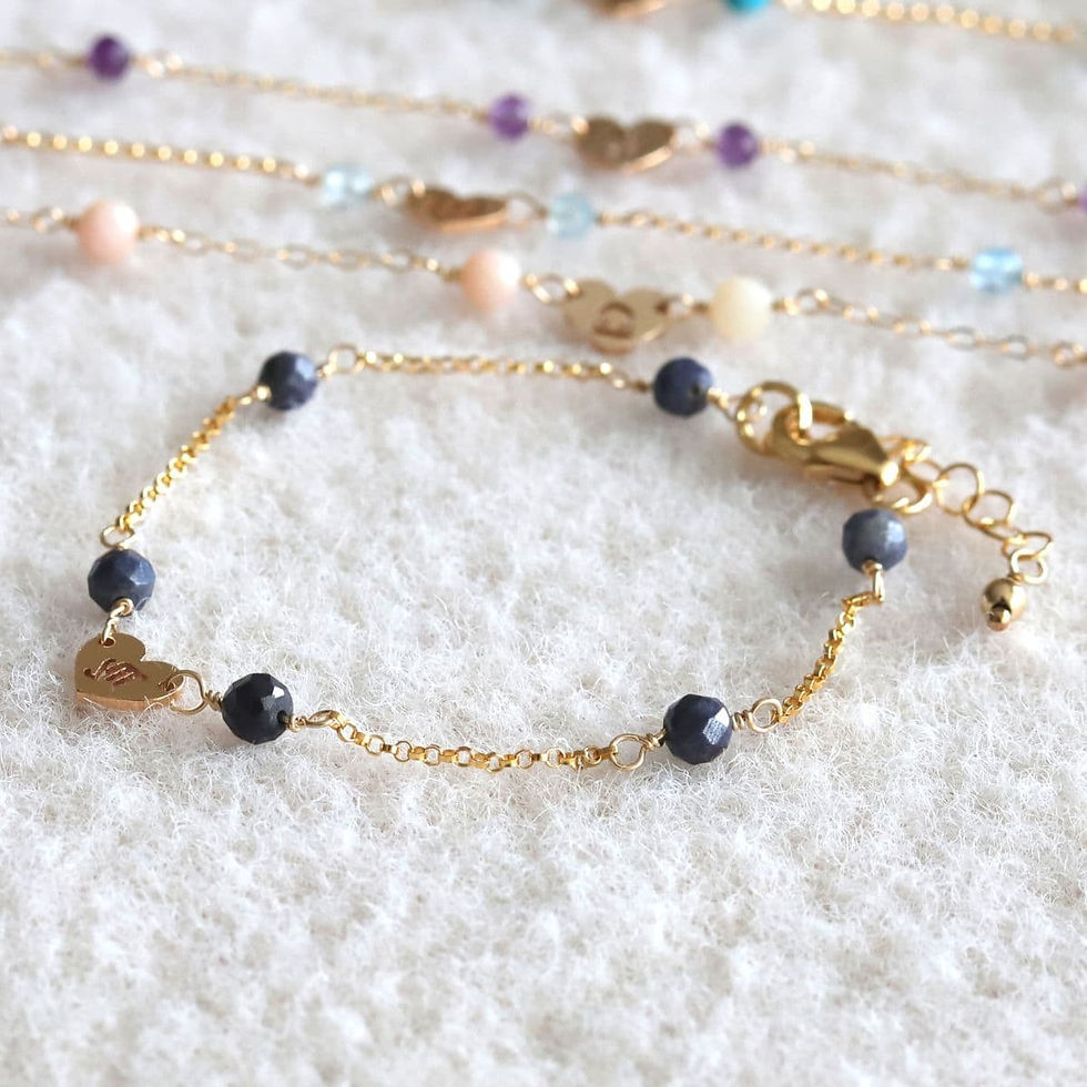 Close-up of customized Virgo zodiac station bracelet with secure clasp. High-quality Sapphire jewelry handcrafted in Canada.