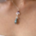 A silver necklace with upside down moonstone crescent, star, and labradorite high-quality crystal pendant in Canada