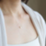 Leo Fire sign heart necklace on model. Bold 14k gold filled zodiac choker by Shokoro Handmade Canada