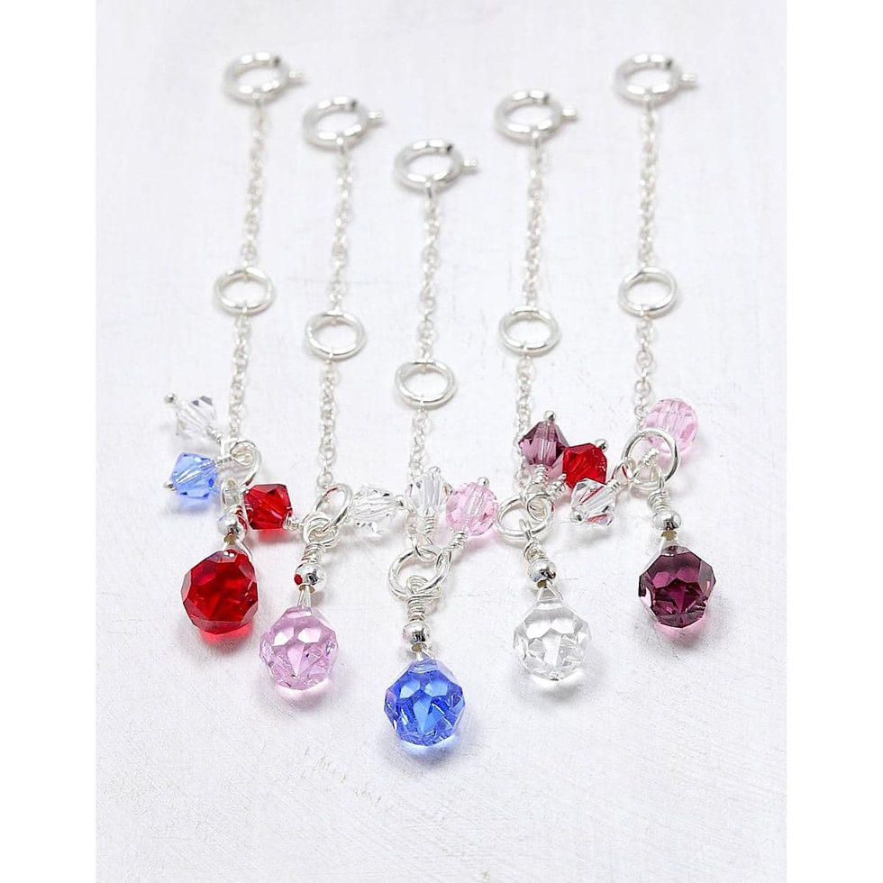 Necklace extender chains with colorful rhinestones, pink, red, blue, purple, and clear crystals, layering quiet luxury style.