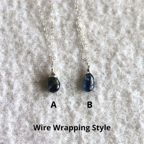 Showing a wire wrapping styling option for Shokoro's natural blue kyanite necklace in sterling silver, handcrafted in Canada.