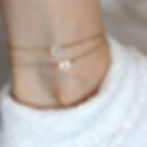 Layered Leo and virgo zodiac heart anklets. showcasing a high-quality timeless everyday luxury look for daily wear.