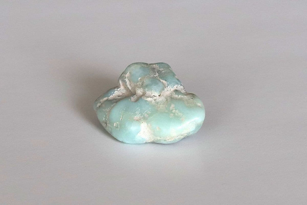 Genuine Dominican Larimar stone from the Shokoro Handmade private collection, illustrating the natural healing properties and intention for peaceful and calming energy.