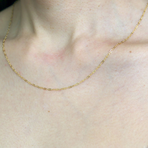 Gold unique link chain necklace over neck, Elegant and minimalist jewelry, Timeless design for every day use.