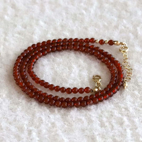 Coiled vibrant Red Agate beaded necklace with 14k gold filled closure, high-quality artisan details for everyday luxury style