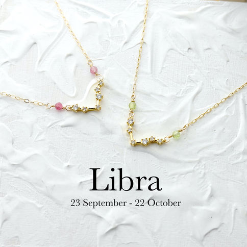 Gold Libra constellation necklaces with natural birthstones Text: "Libra, 23 September - 22 October, Statement cosmic jewelry