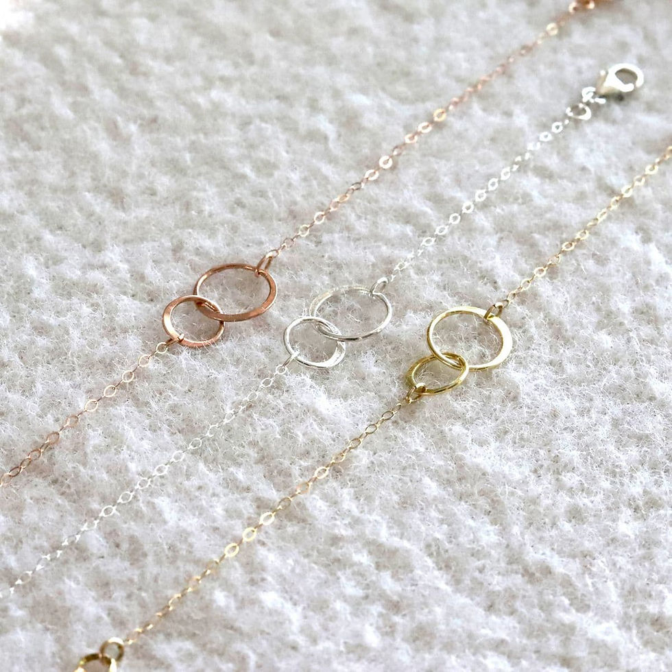 Dainty Double Circle Bracelet, handcrafted with 14k gold filled, rose gold filled, and .925 sterling silver of symbol of love