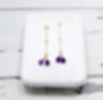 Gold and silver chain necklace extenders with purple amethyst gemstones, Creating a minimalist and elegant design.