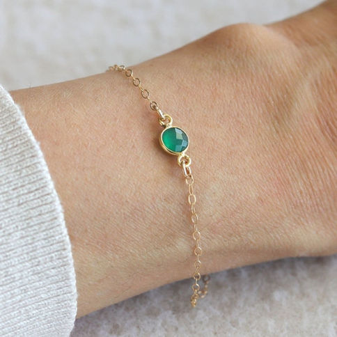 14k gold filled bracelet with green onyx gemstone on wrist, Artisan minimalist intention crystal from Shokoro, Toronto.