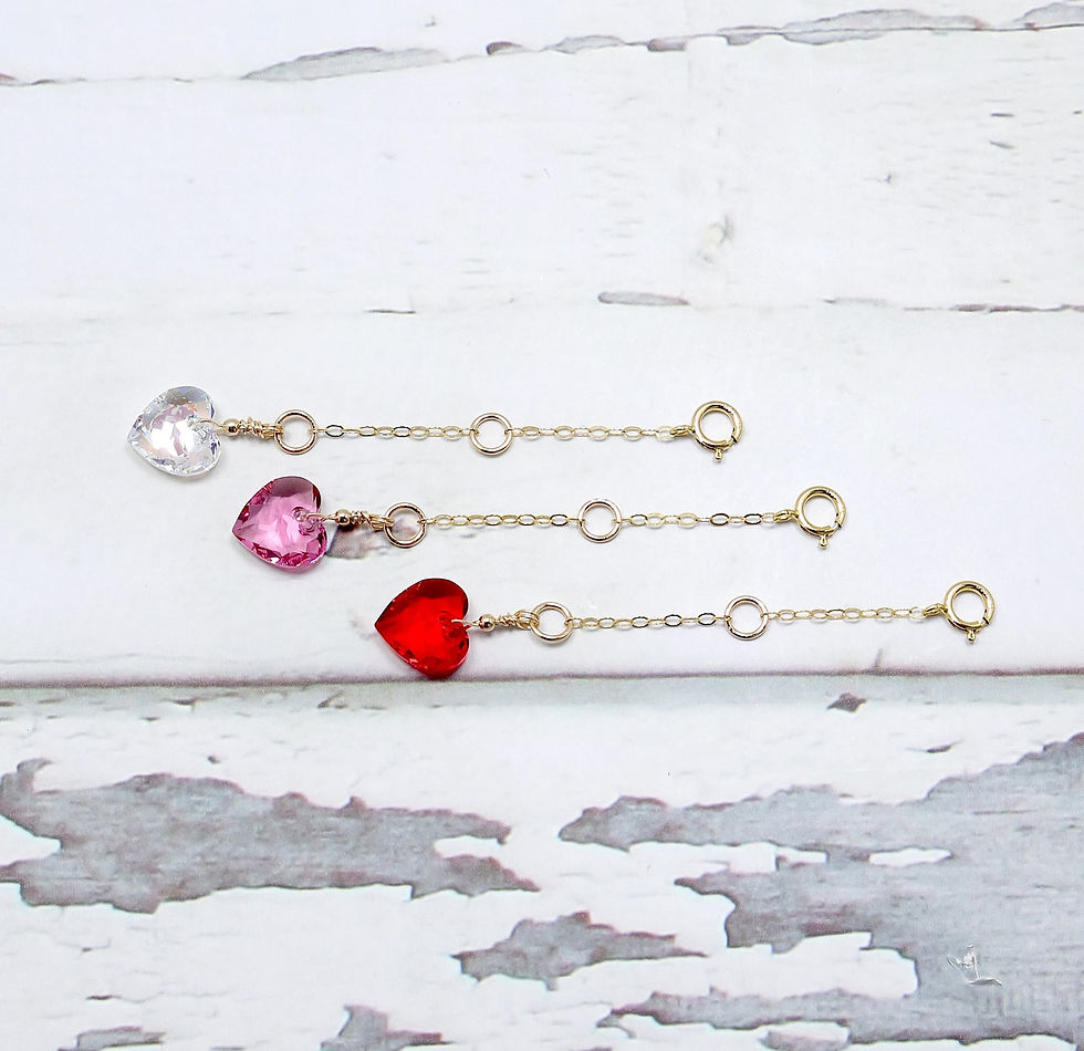 Three high quality14k gold filled necklace extender chains with heart-shaped Swarovski pendants in clear, pink, and red