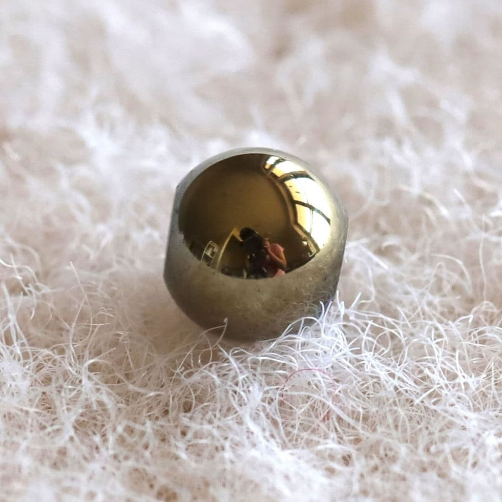 AAA, Pyrite crystal bead from the Shokoro Handmade collection, illustrating the natural healing properties and intention for stability mind and confidence.