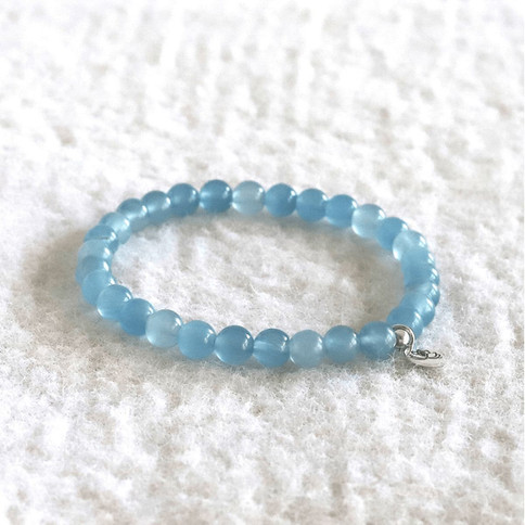 Artisan Blue Calcite beaded bracelet for Peace. Natural Argentine Blue gemstone jewelry handcrafted in Canada.
