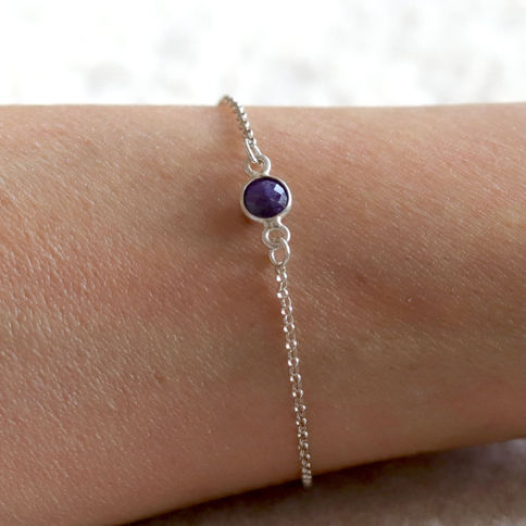 Sterling silver chain bracelet with a natural amethyst on a wrist. Dainty crystal jewelry Shokoro Canada