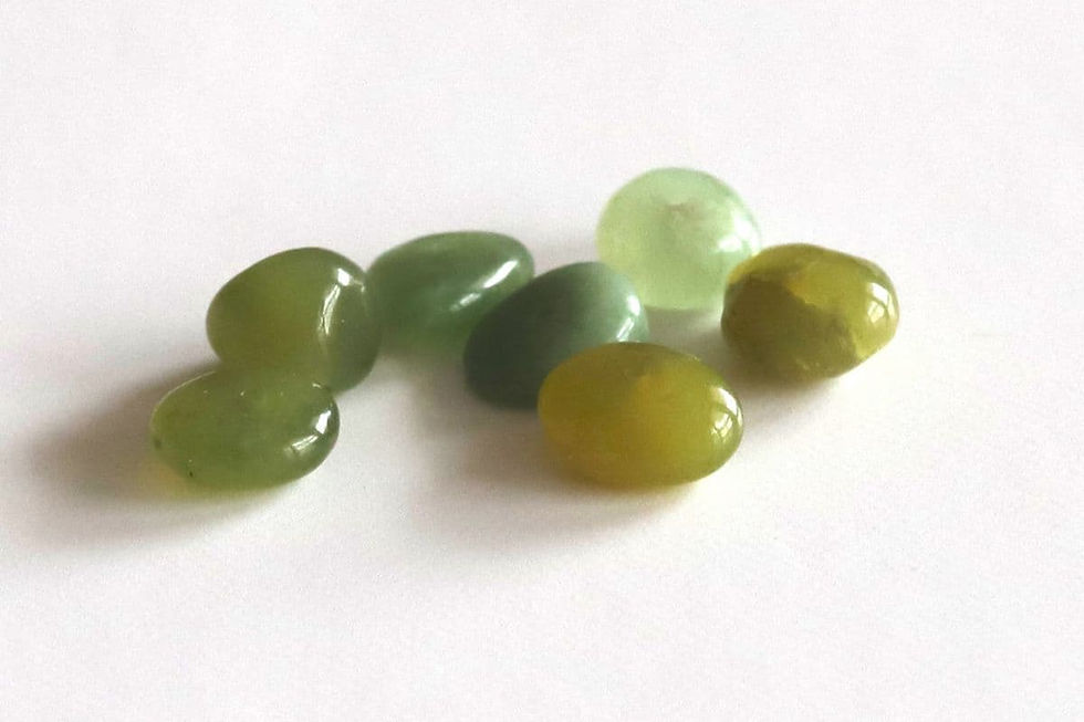 Genuine Serpentine pebble stone from the Shokoro Handmade collection, illustrating the natural healing properties and intention for transformation and spiritual insight.