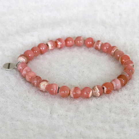 AAA Grade Rhodochrosite bracelet with sterling silver tag. High-quality raspberry pink crystal jewelry Toronto