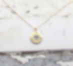 Gold evil eye pendant on a delicate 14k gold filled chain, handcrafted protection necklace in Toronto.