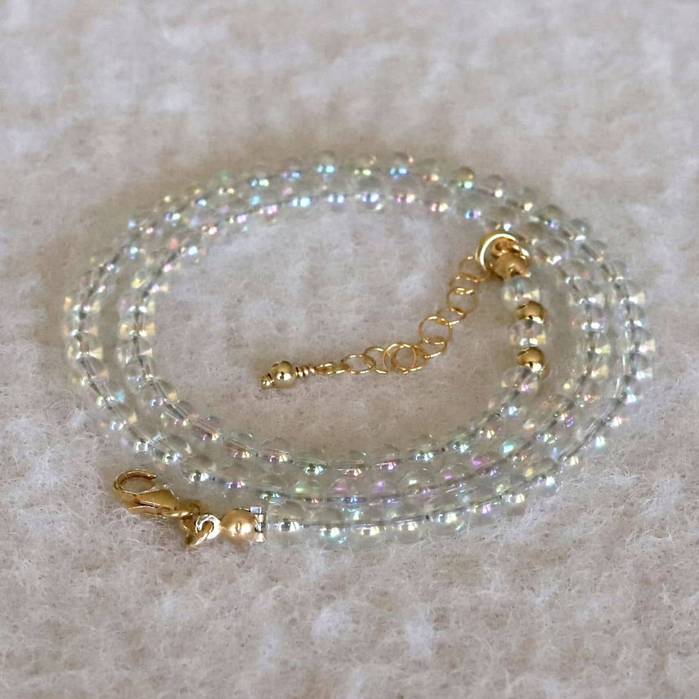 High quality smooth Angel Aura Quartz beaded necklace with 14k gold filled clasp, artisan details and minimalist design.