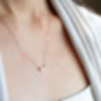 Aries Fire sign heart necklace on model. High-quality 14k gold filled zodiac choker by Shokoro Canada