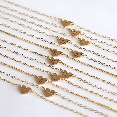 Artisan zodiac heart necklaces for all 12 signs. High-quality 14k gold filled layering jewelry. Shokoro Canada