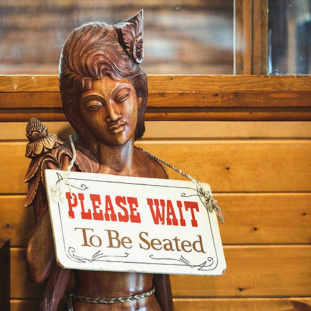 Nora's Homestyle Kitchen & Bar Please Wait Sign