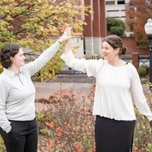 a queer couple spinning each other and doing twirls