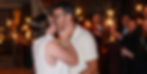 a couple kissing during their sparkler exit captured by a wedding photographer in charlottesville virginia