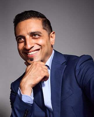 Reza Headshot0163_4x5_CloseUp.jpg